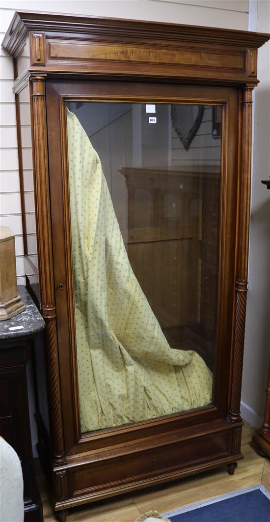 A 19th century French mahogany armoire, enclosed by a glazed door W.105cm
